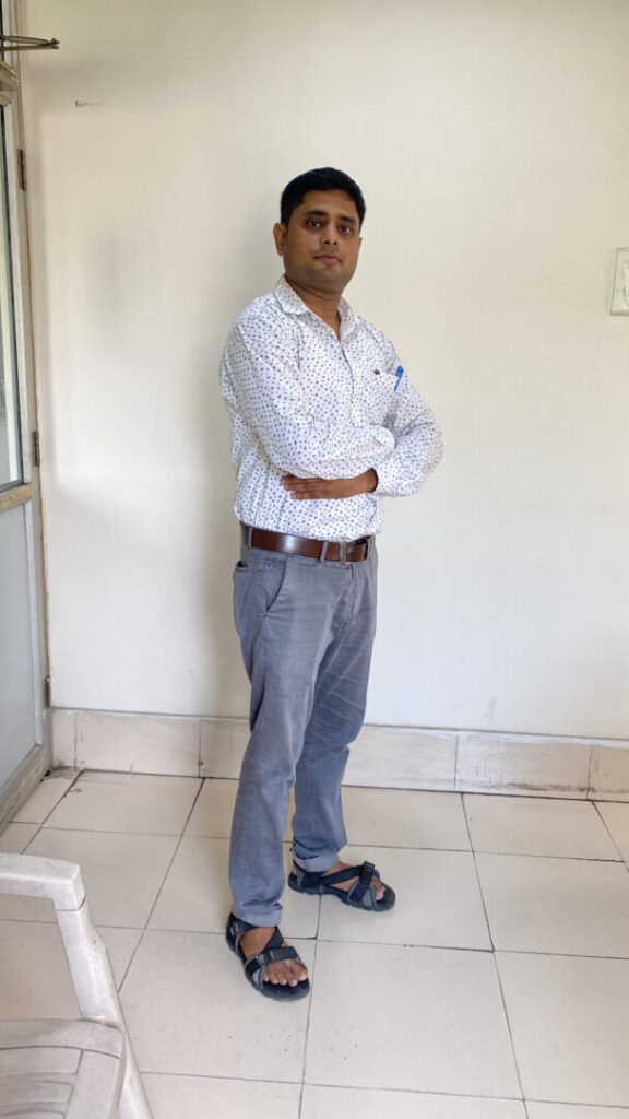 Man posing in casual office attire