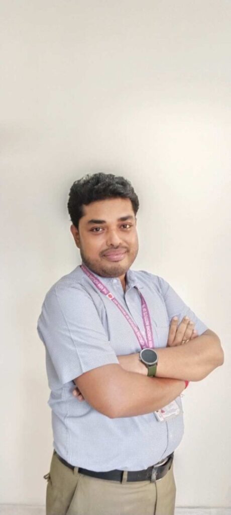 Man in shirt with lanyard and smartwatch