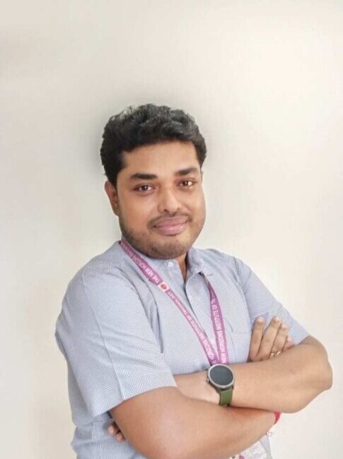 Man in shirt with lanyard and smartwatch